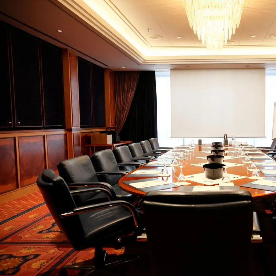 Executive boardroom table and leather chairs supplied by Hambanati